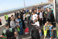 بالصور: وصول الفوج الأول من معتمري مدينة يافا إلى ديارهم سالمين 